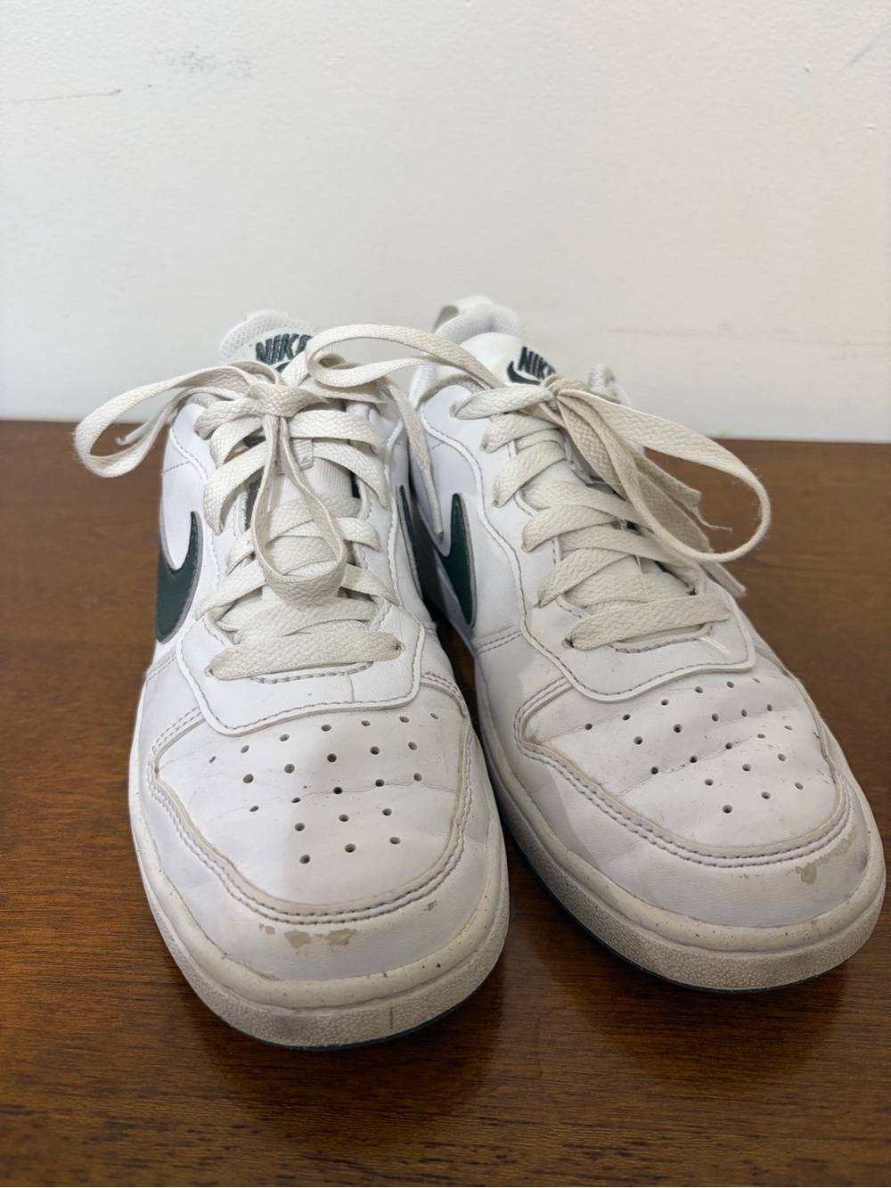 Nike Men’s White Sneakers with Dark Green Swoosh